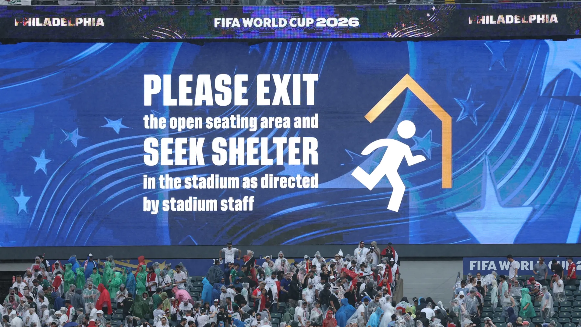 Philadelphia Stadium's big screen shows a weather warning during half time.