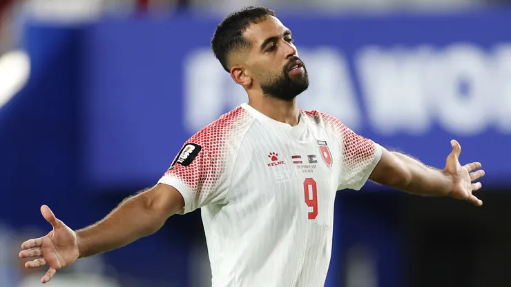 Ali Olwan celebrates a goal for Jordan.