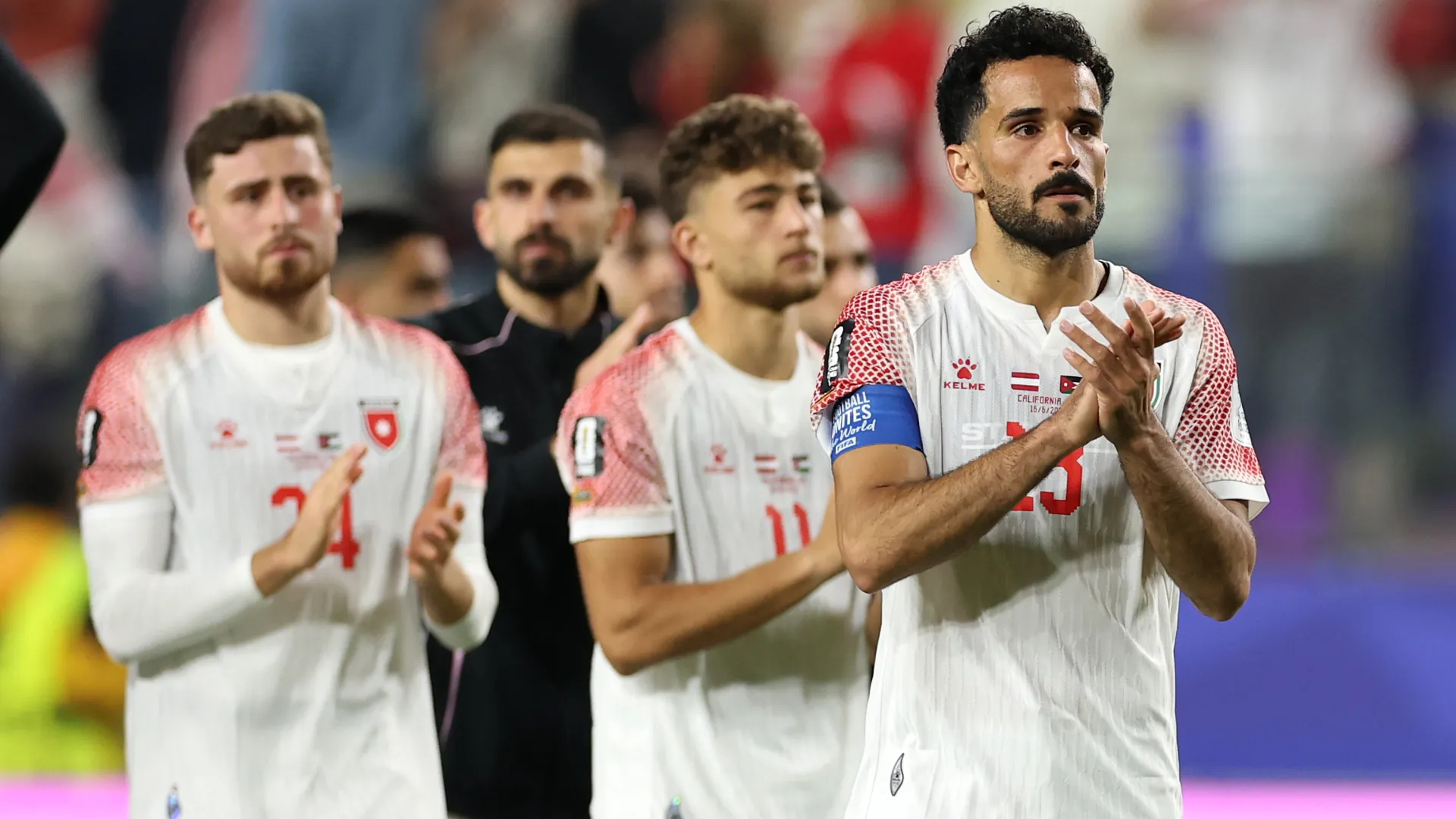 Mahmoud Almardi #13 of Jordan applauds fans after the team’s 1-3 defeat vs Austria. (Getty Images)