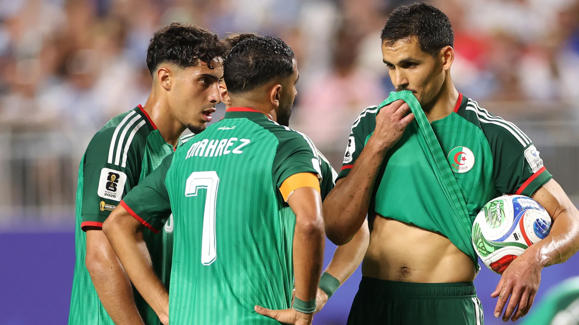 Players of Algeria talk before a free kick during the game vs Argentina. (Getty Images)