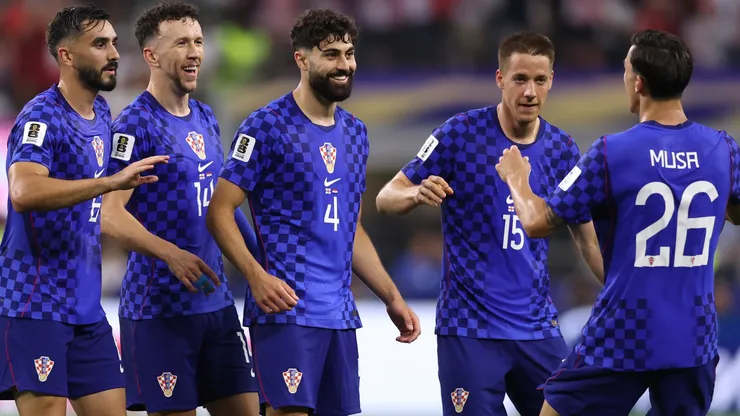 Petar Musa #26 of Croatia celebrates with teammates.