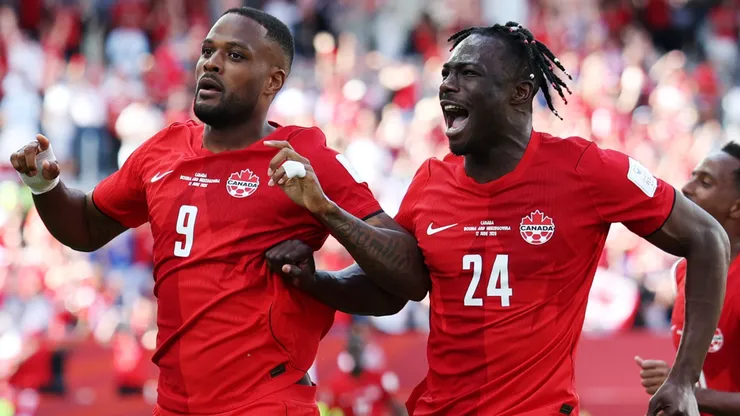 Cyle Larin #9 of Canada celebrates a goal.