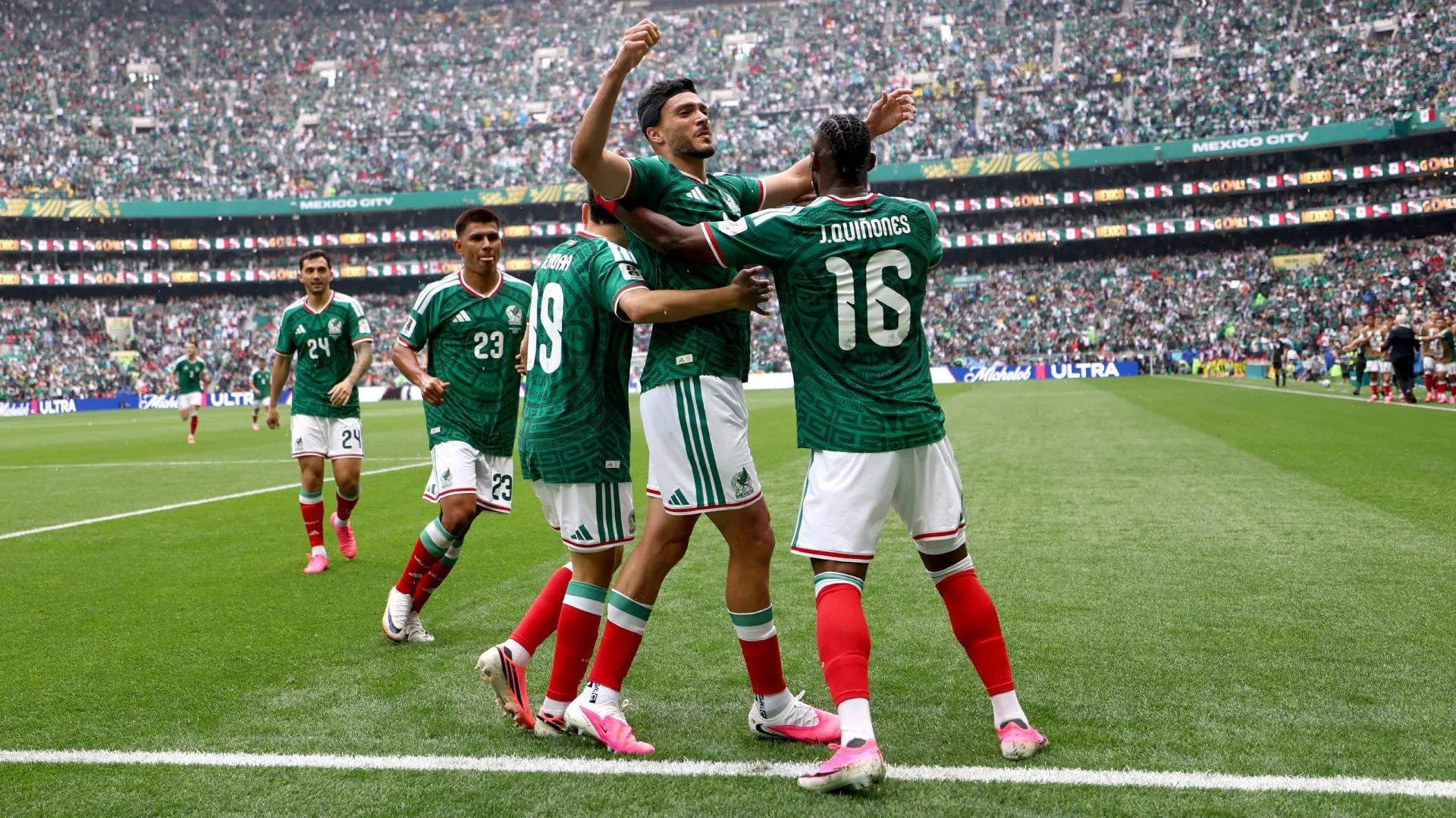 Raul Jimenez of Mexico celebrates scoring against South Africa.