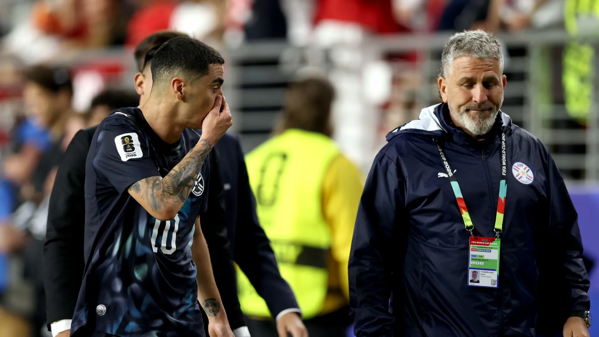 Miguel Almiron #10 of Paraguay reacts after receiving a red card for covering his mouth.