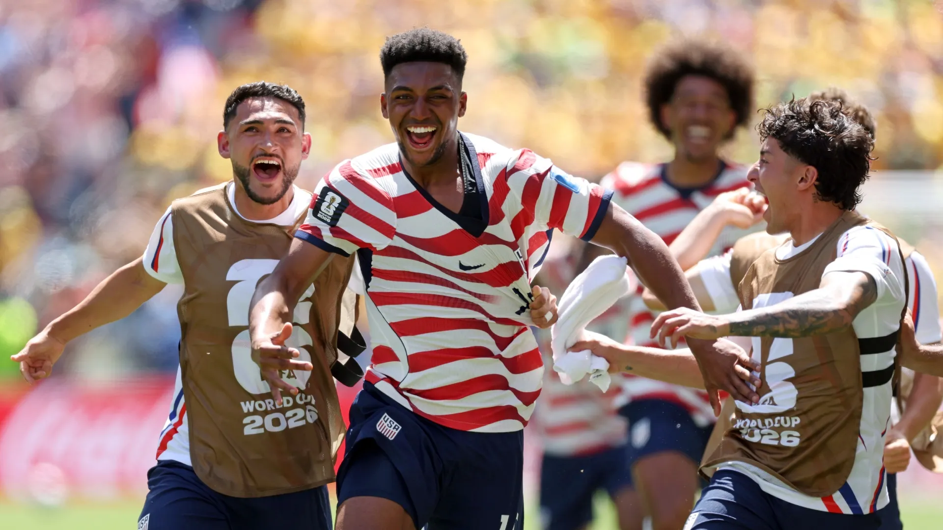 Alex Freeman #16 of the United States celebrating with teammates.