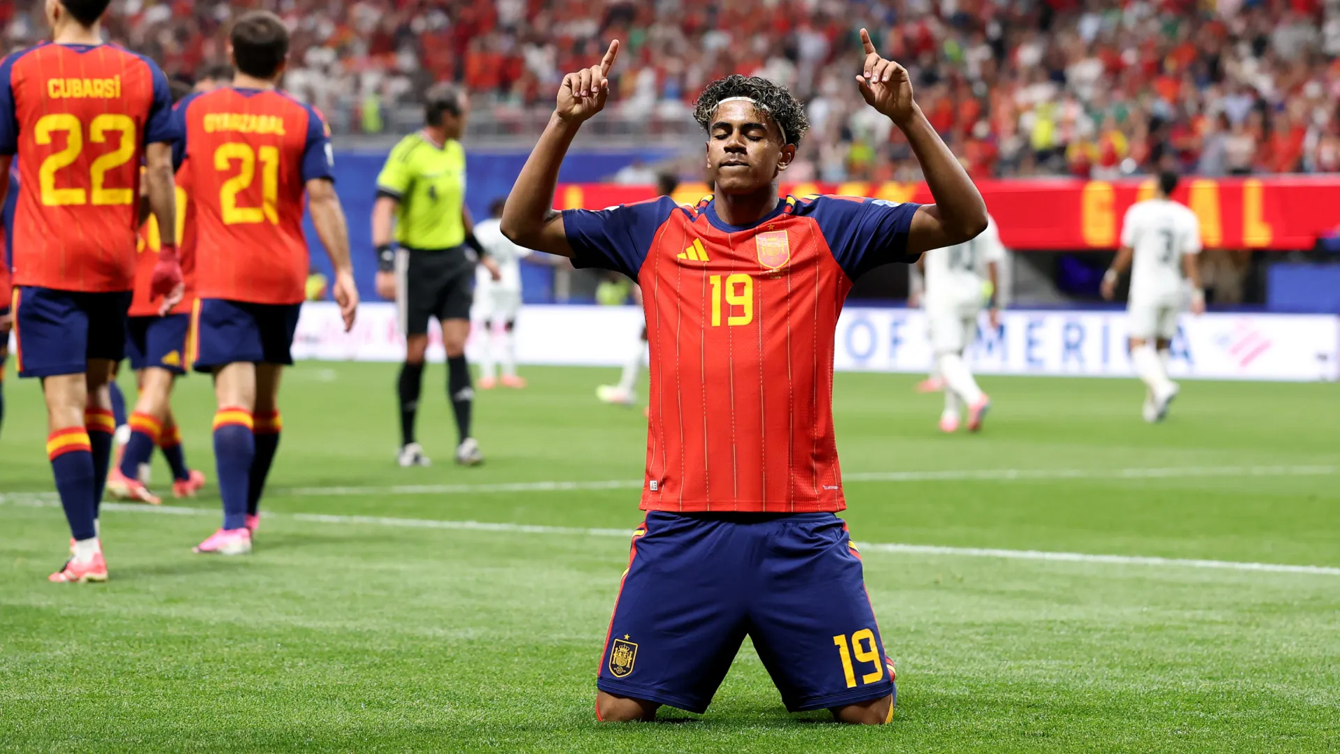 Lamine Yamal celebrates a goal for Spain. (Getty Images)