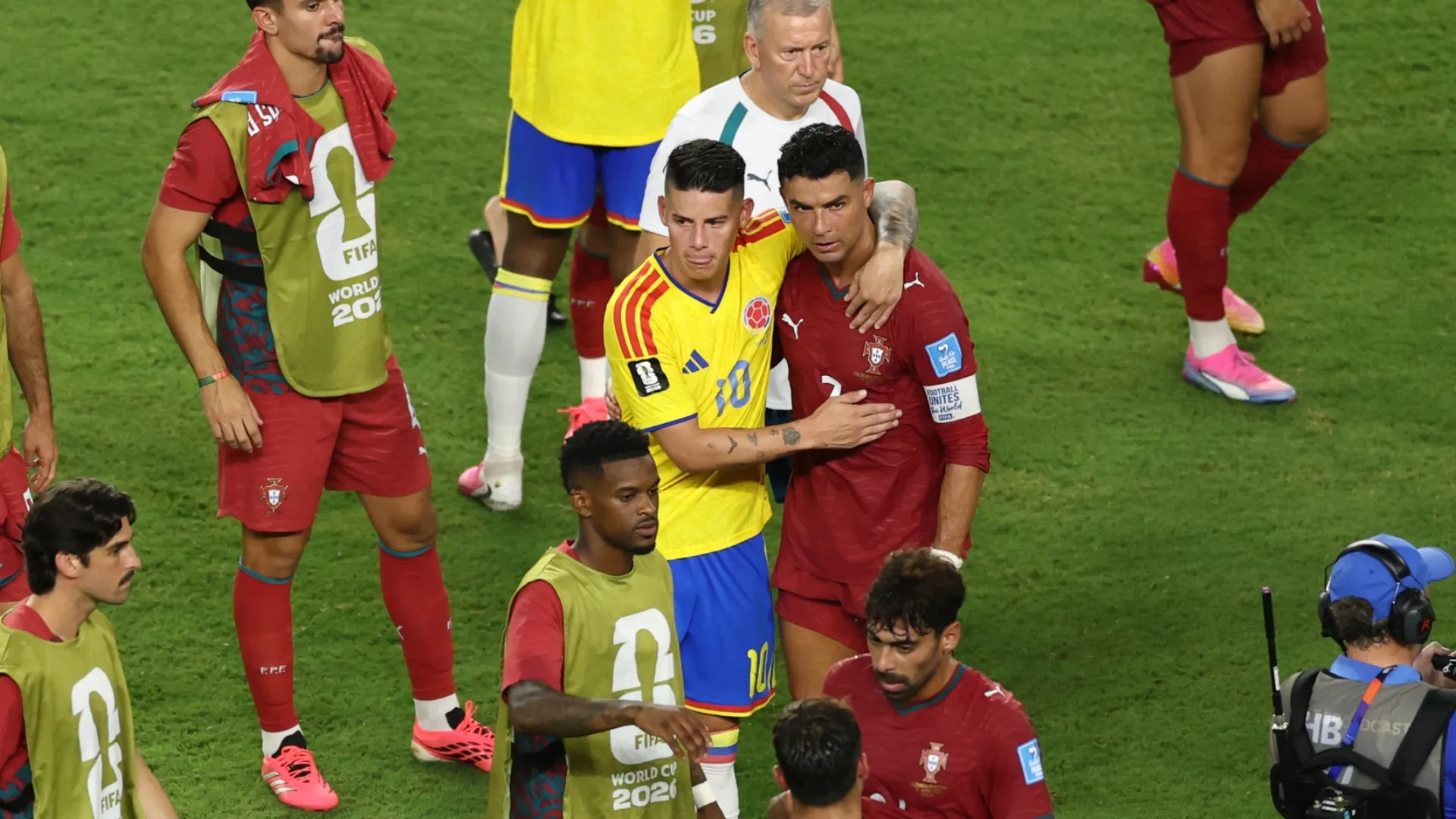 James Rodriguez #10 of Colombia and Cristiano Ronaldo #7 of Portugal embrace after the scoreless draw in the World Cup 2026.