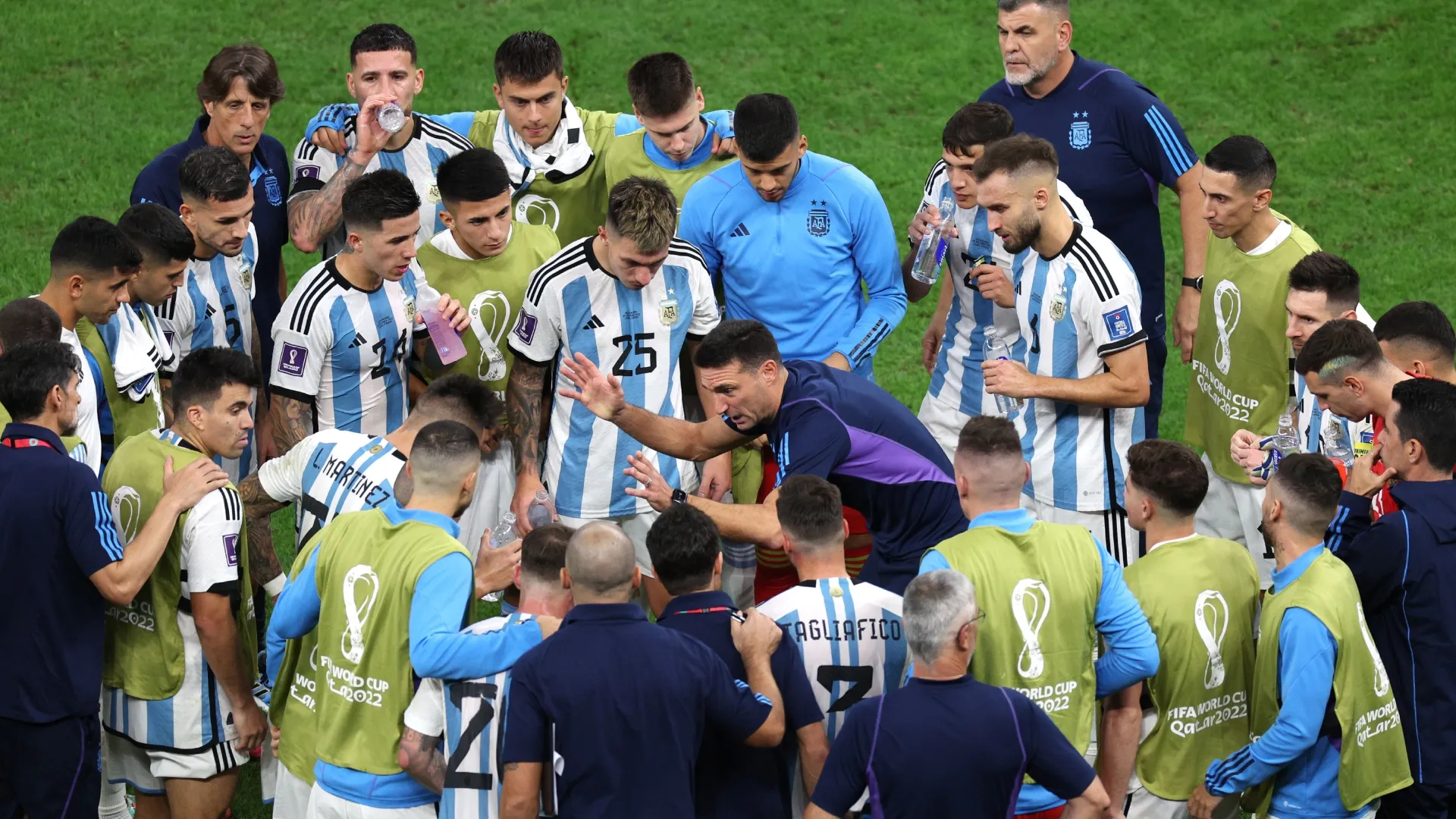 Lionel Scaloni, Head Coach of Argentina, speaks to his team in a huddle in extra time during the 2022 World Cup.