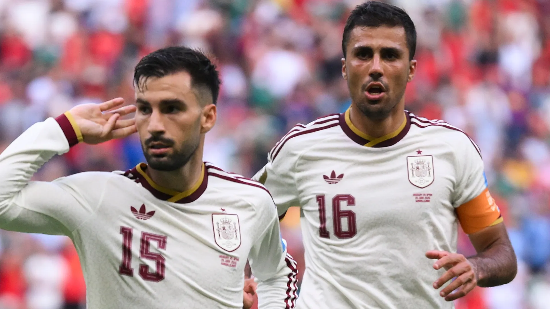 Alex Baena #15 and Rodri Hernandez #16 of Spain celebrate a goal.