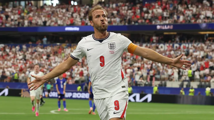 Harry Kane of England celebrates after scoring a goal.