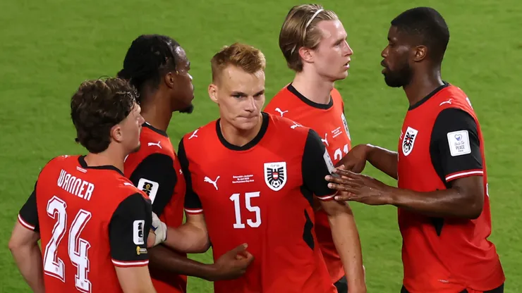 Austrian players celebrating a victory in the 2026 World Cup.