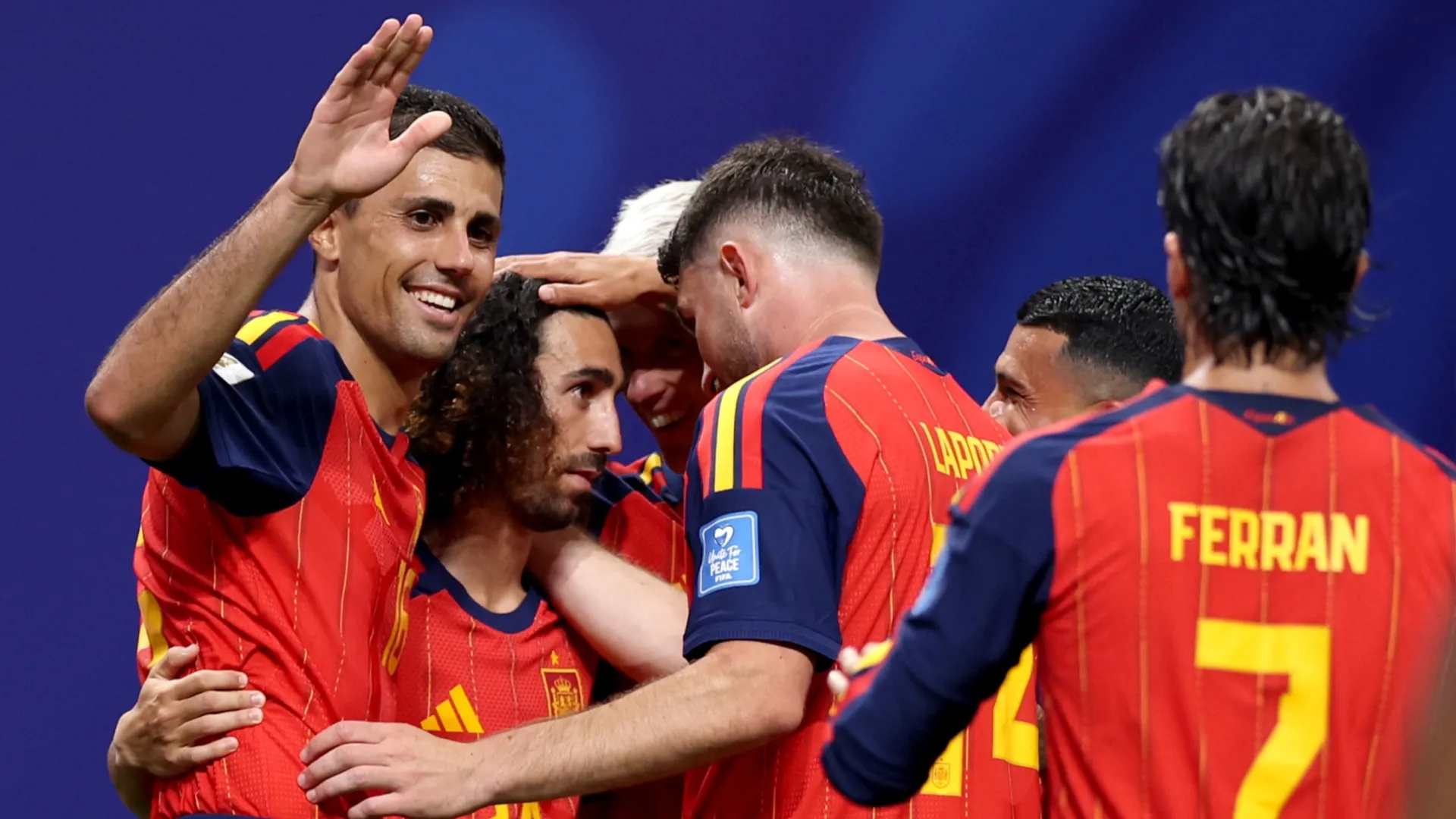 Marc Cucurella #24 of Spain celebrates with teammates after scoring a goal.