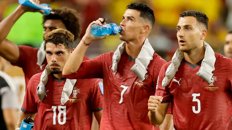 Cristiano Ronaldo #7 of Portugal drinks at the hydration break