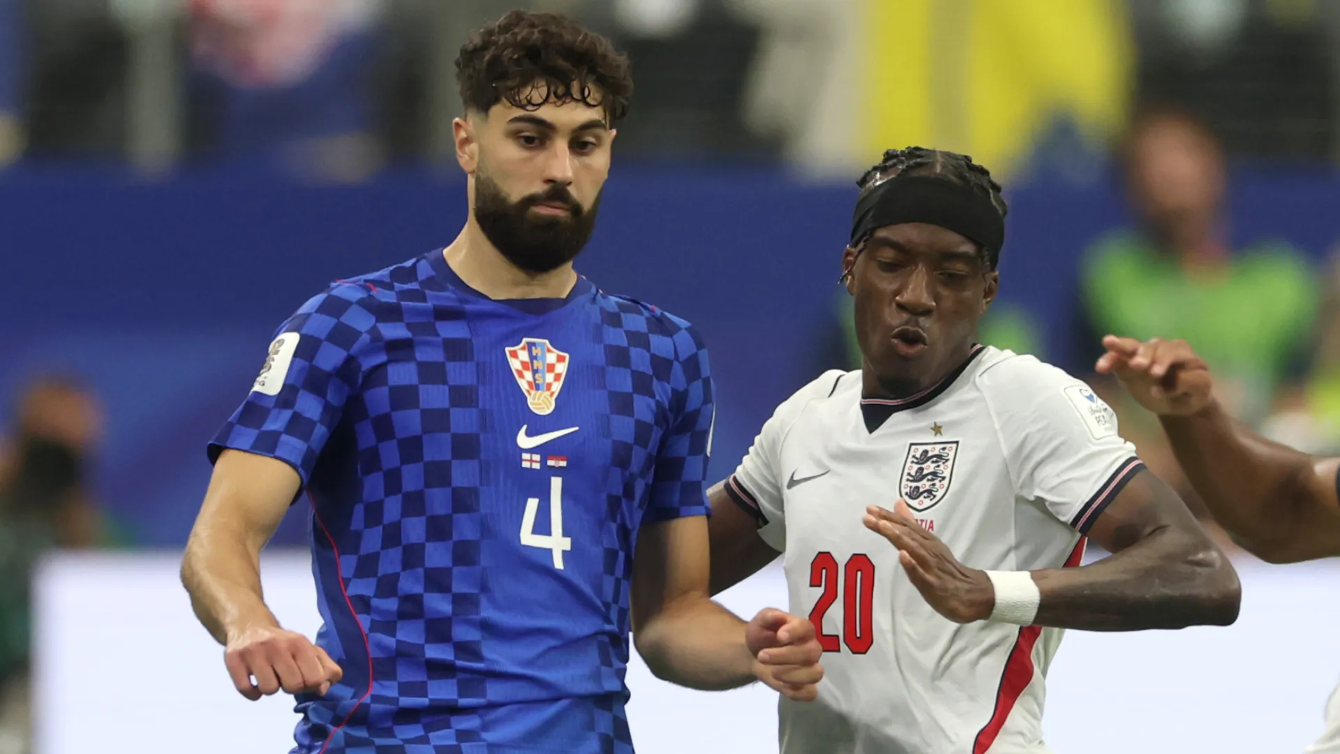 Josko Gvardiol #4 of Croatia is challenged by Noni Madueke #20 of England. (Getty Images)