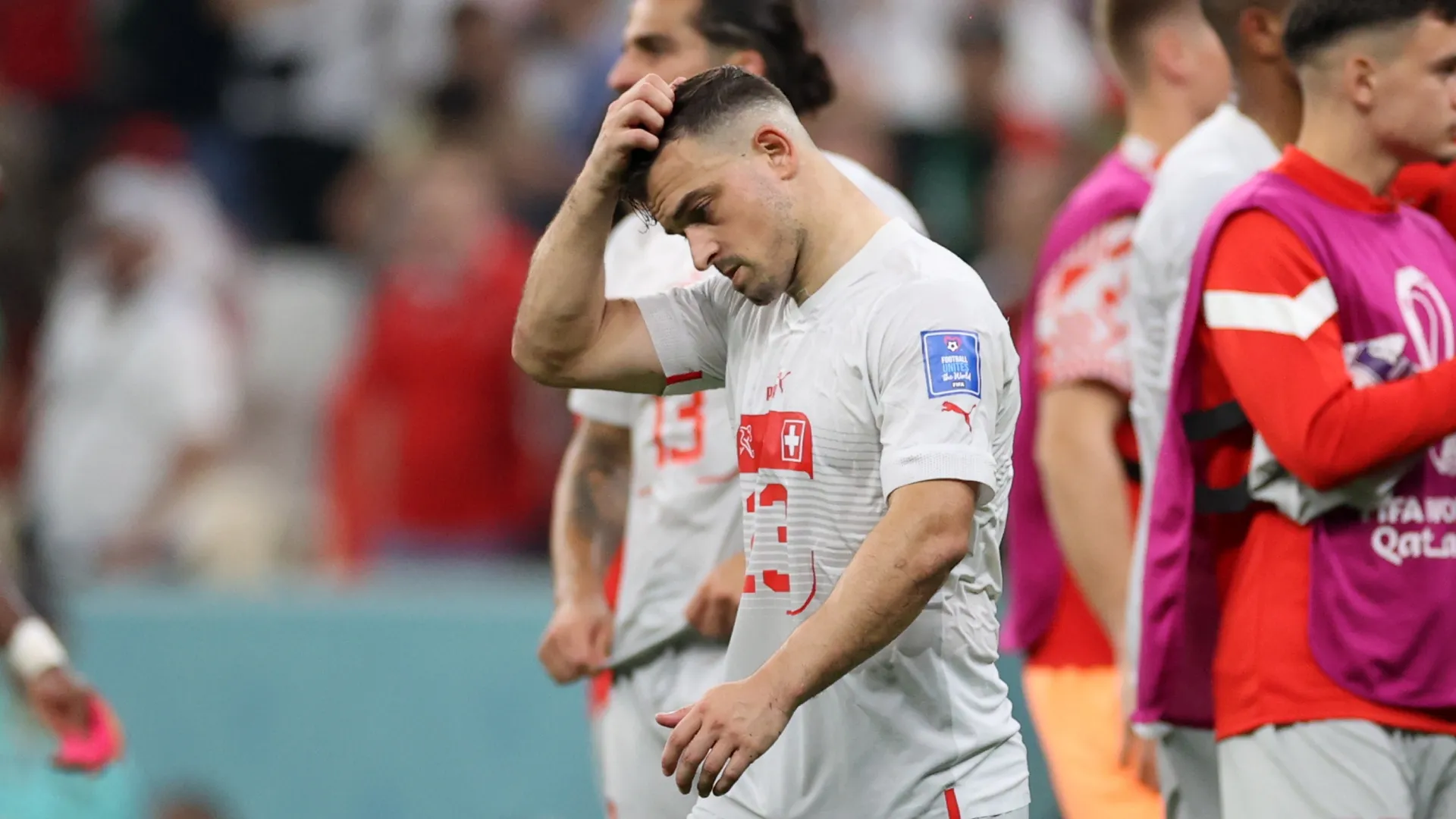 Xherdan Shaqiri of Switzerland looks dejected after their sides' elimination from the 2022 World Cup against Portugal.