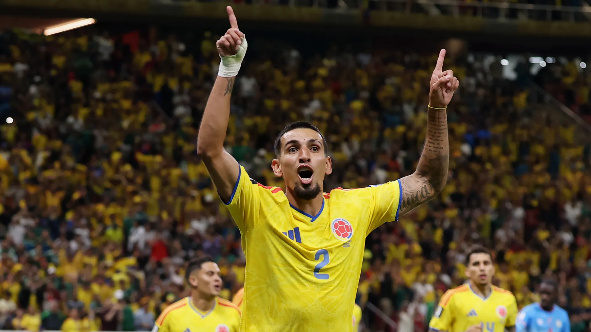 Daniel Munoz #2 of Colombia celebrates a goal. (Getty Images)