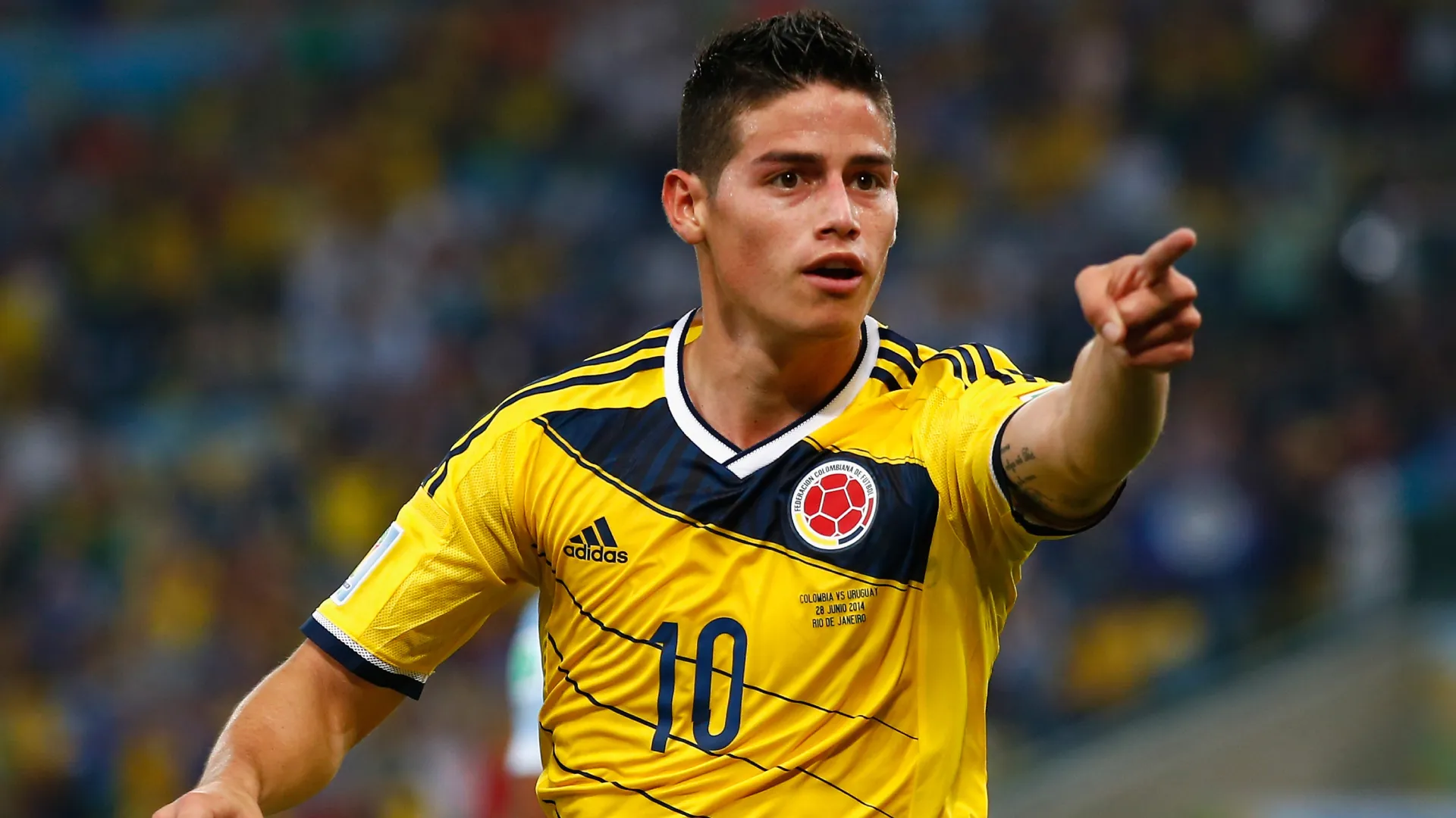James Rodriguez celebrates a goal for Colombia vs Uruguay at the 2014 World Cup. (Getty Images)