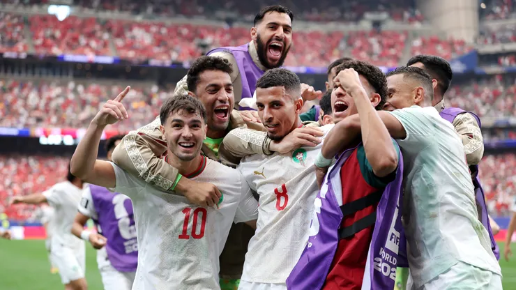 Azzedine Ounahi #8 of Morocco celebrates with teammates.