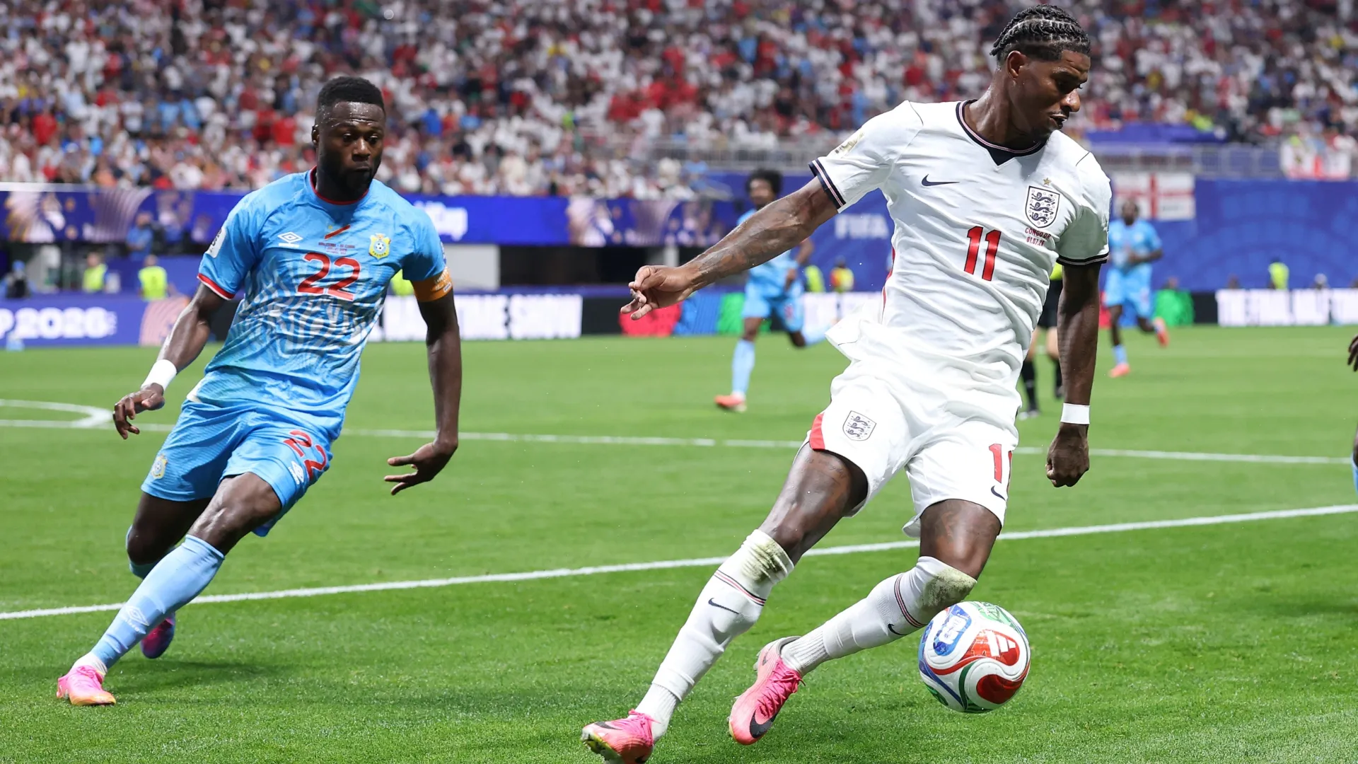 Marcus Rashford #11 of England runs with the ball.