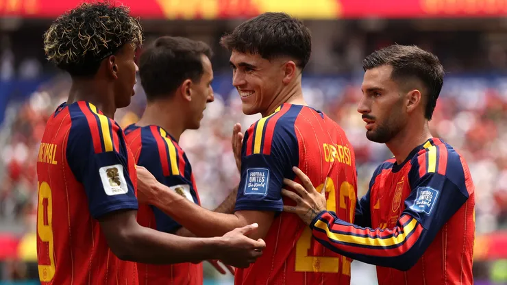 Pau Cubarsi #22 of Spain celebrates after a goal scored by Pedro Porro #12 celebrates.