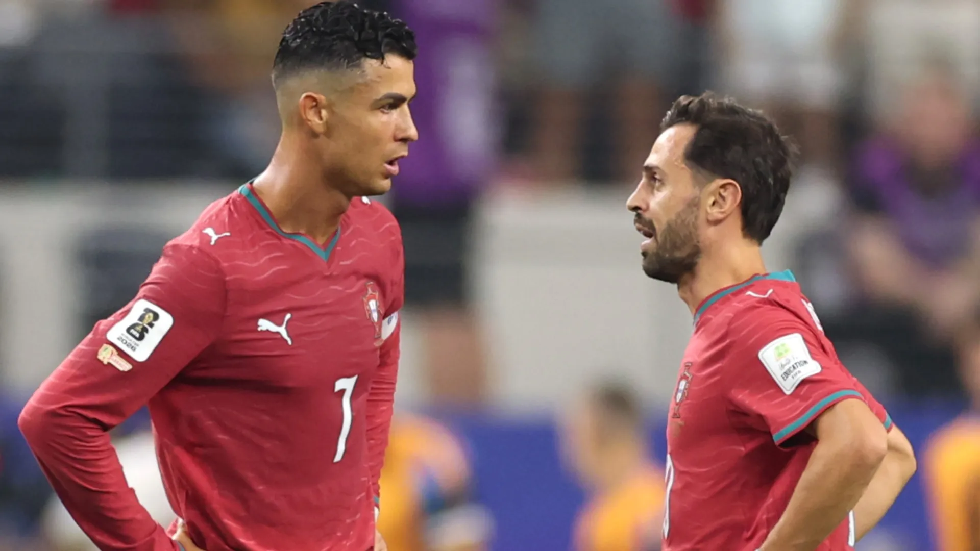 Cristiano Ronaldo #7 and Bernardo Silva #10 of Portugal react after conceding a goal.