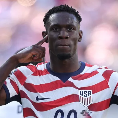 Why can Folarin Balogun play for the USMNT against Belgium despite his suspension?