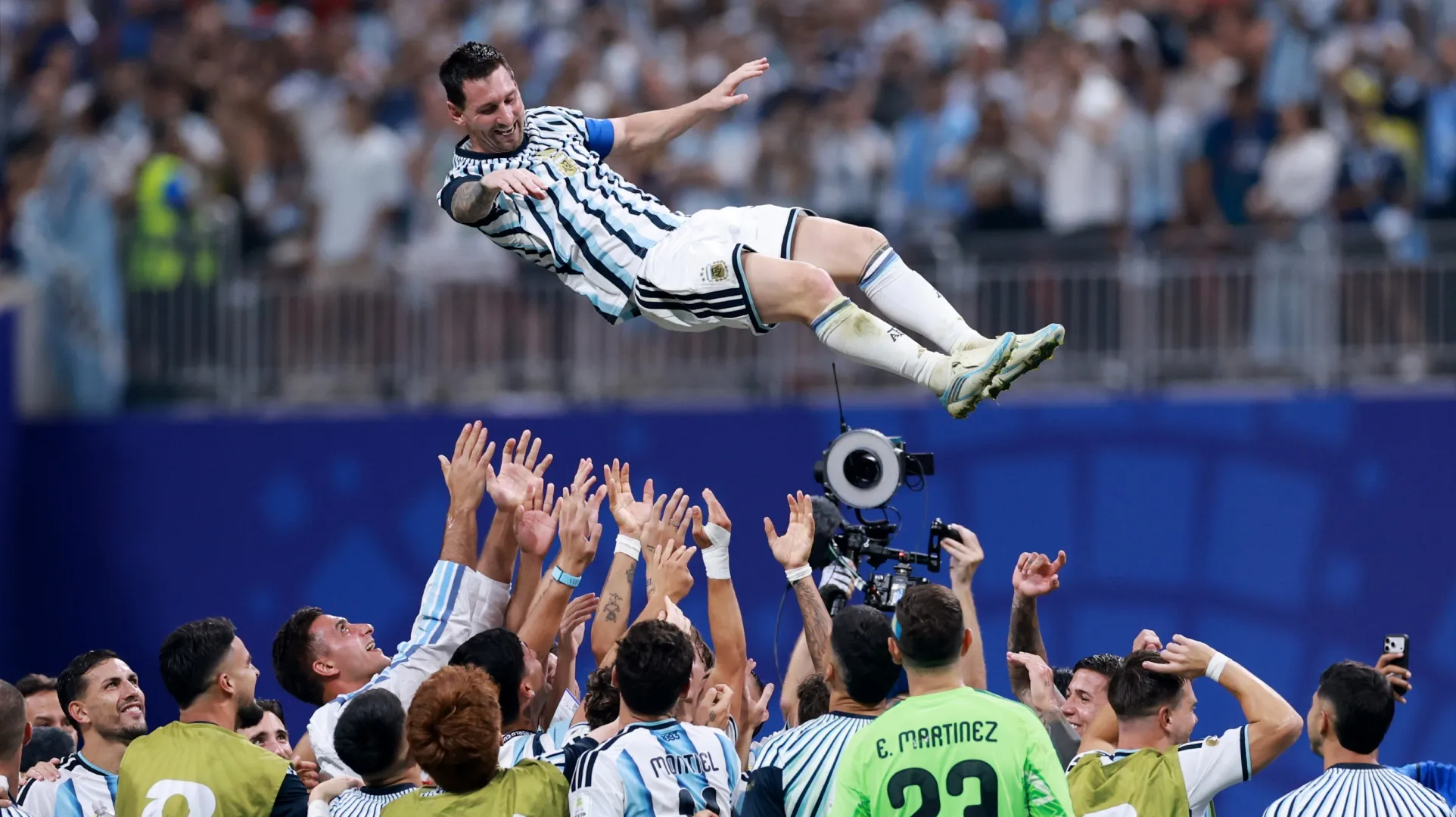 Lionel Messi #10 of Argentina celebrates with teammates after the 3-2 victory (Elsa/Getty Images).