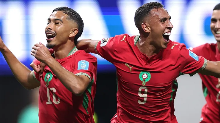 Gessime Yassine #16 of Morocco celebrates with Soufiane Rahimi #9 after scoring a goal.