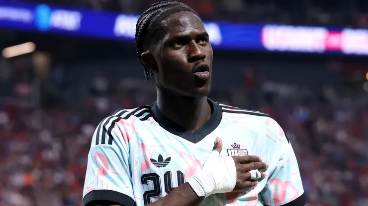 Amadou Onana #24 of Belgium celebrates scoring