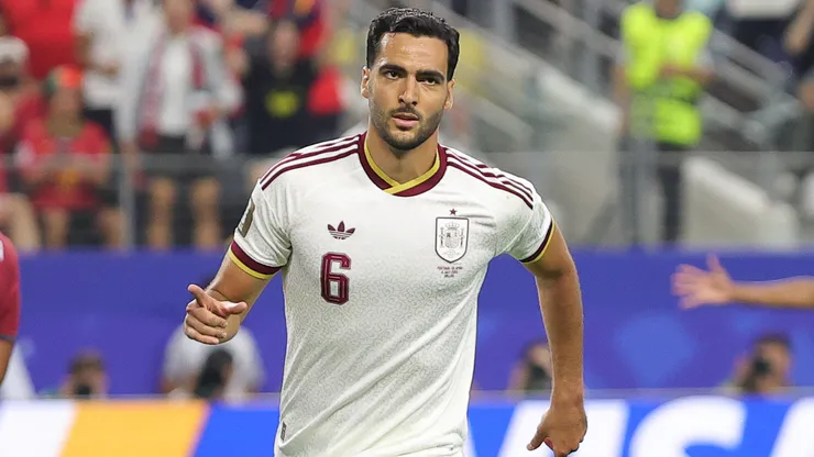 Mikel Merino celebrates a goal for Spain.