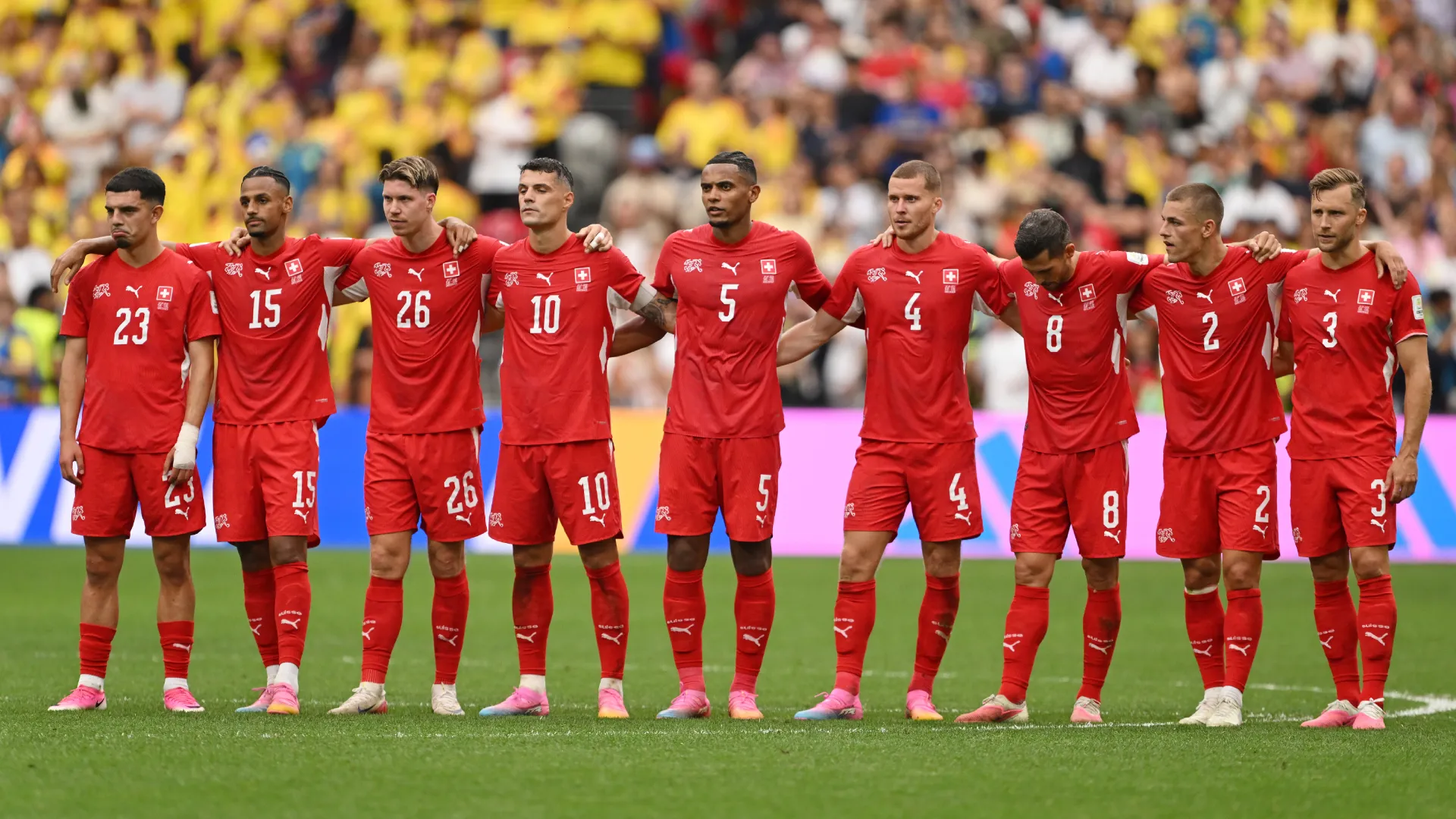 Switzerland players react during the penalty shootout vs Colombia. (Getty Images)