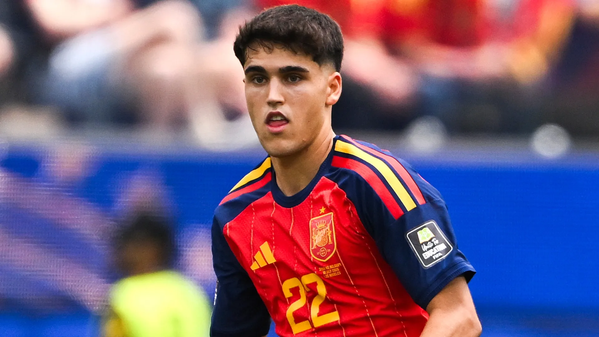 Pau Cubarsi #22 of Spain runs with the ball during the FIFA World Cup 2026.