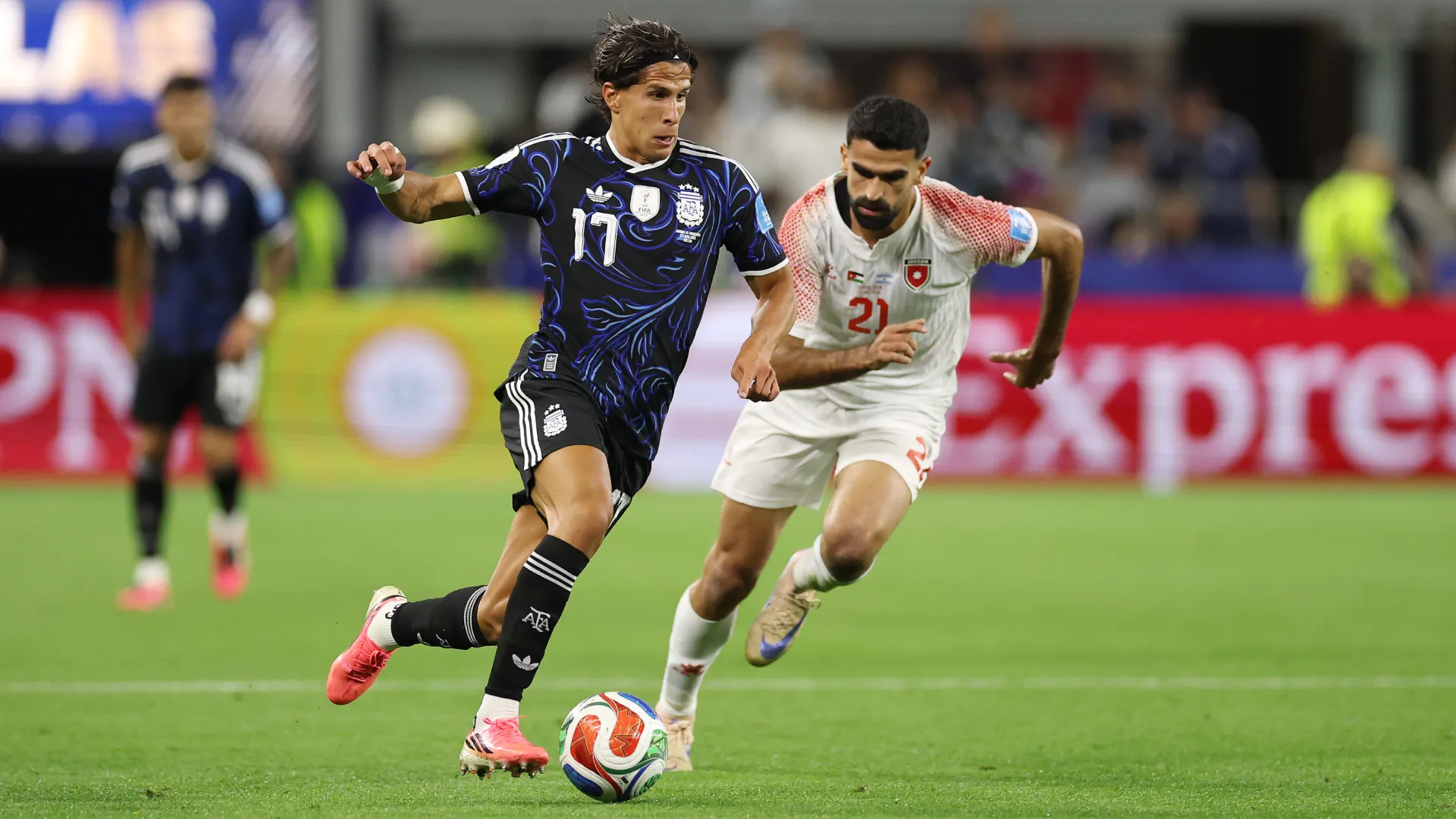 Giuliano Simeone #17 of Argentina is defended by Nizar Alrashdan #21 of Jordan. (Getty Images)