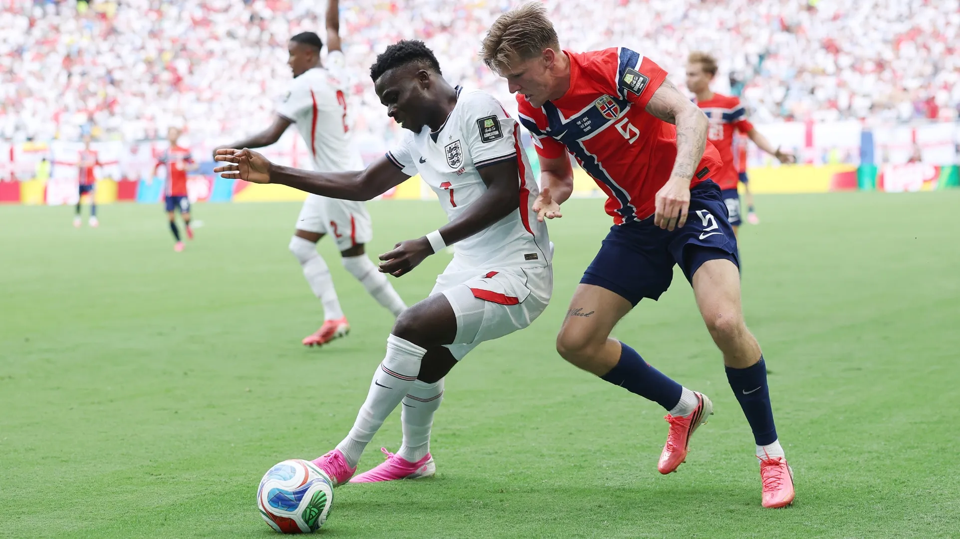 Bukayo Saka #7 of England competes for the ball against David Moller Wolfe #5 of Norway.