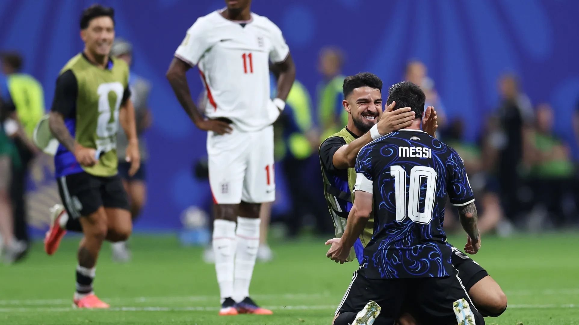 Lionel Messi #10 of Argentina celebrates with teammates.