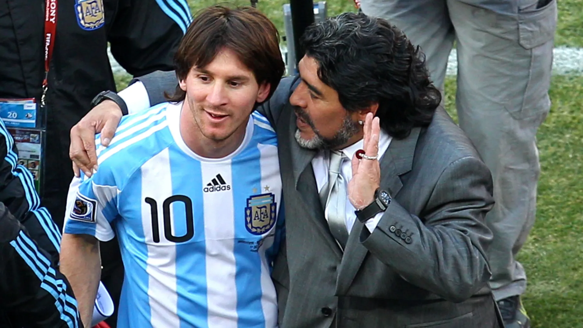 Diego Maradona head coach of Argentina talks with Lionel Messi.