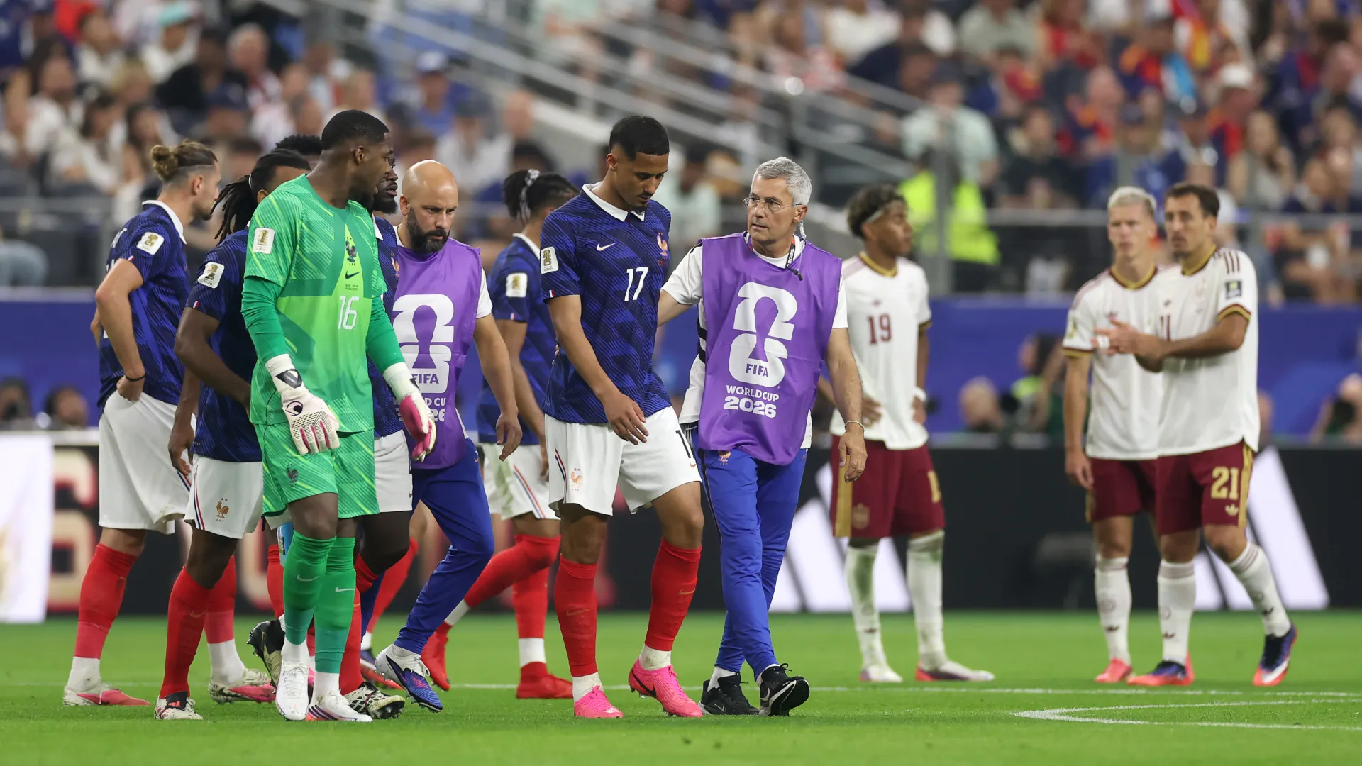 William Saliba #17 of France is attended to by medical staff after sustaining an injury vs Spain. (Getty Images)