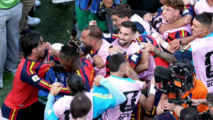 Ferran Torres #7 of Spain celebrates with teammates after scoring a goal.