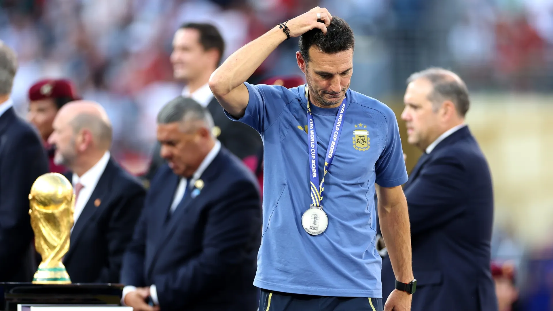Lionel Scaloni, Head Coach of Argentina, reacts after receiving the silver medal.