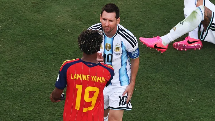Lamine Yamal #19 of Spain is congratulated by Lionel Messi #10 of Argentina