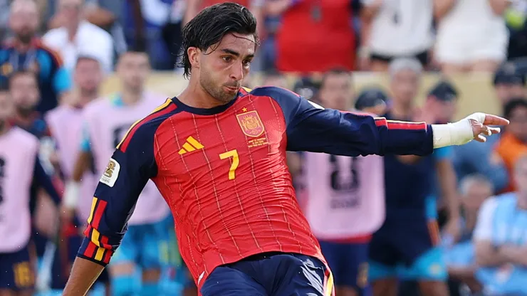 Ferran Torres #7 of Spain scores a goal against Argentina.