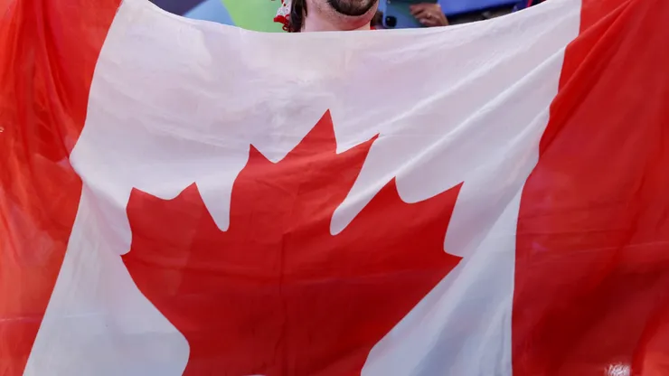 Fan holds Canadian flag