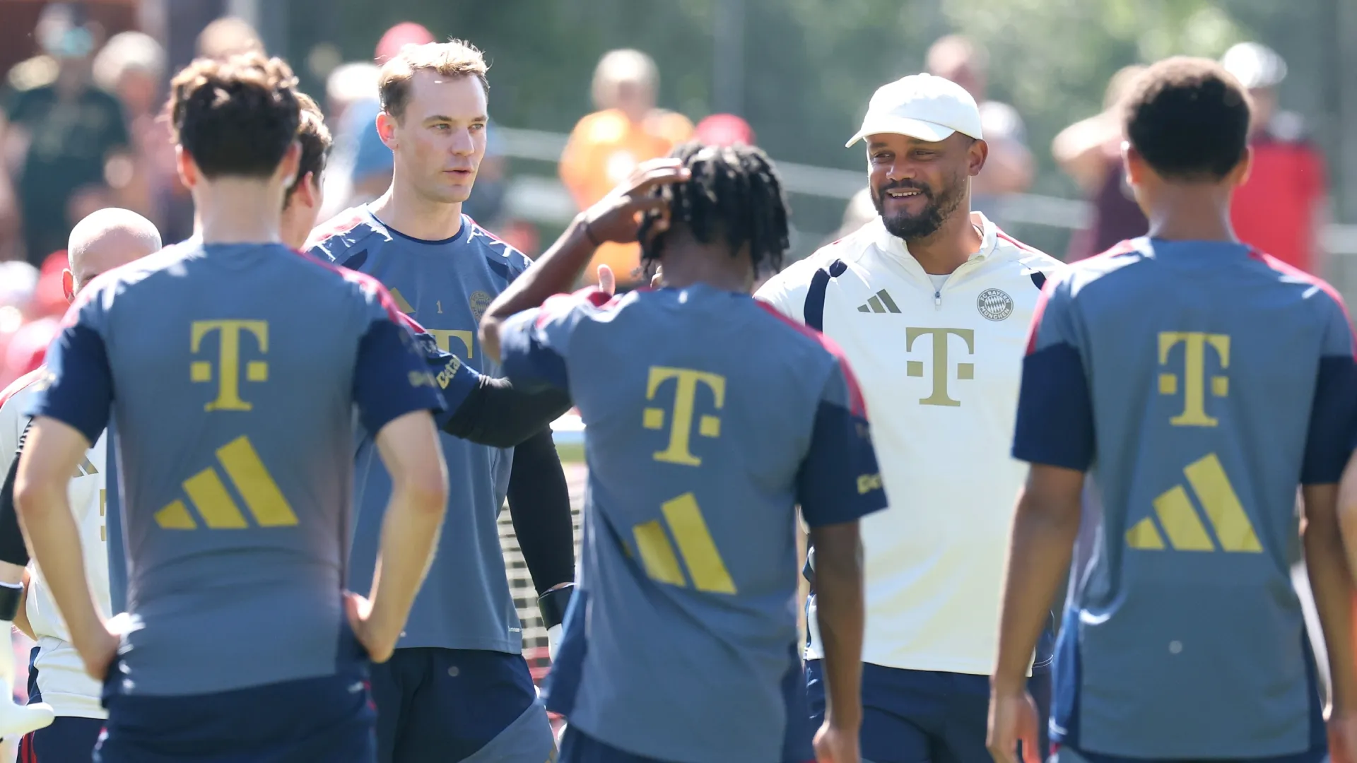 Manuel Neuer alongside Bayern Munich boss Vincent Kompany prior to the summer training camp at Stadion am Birkenmoos.