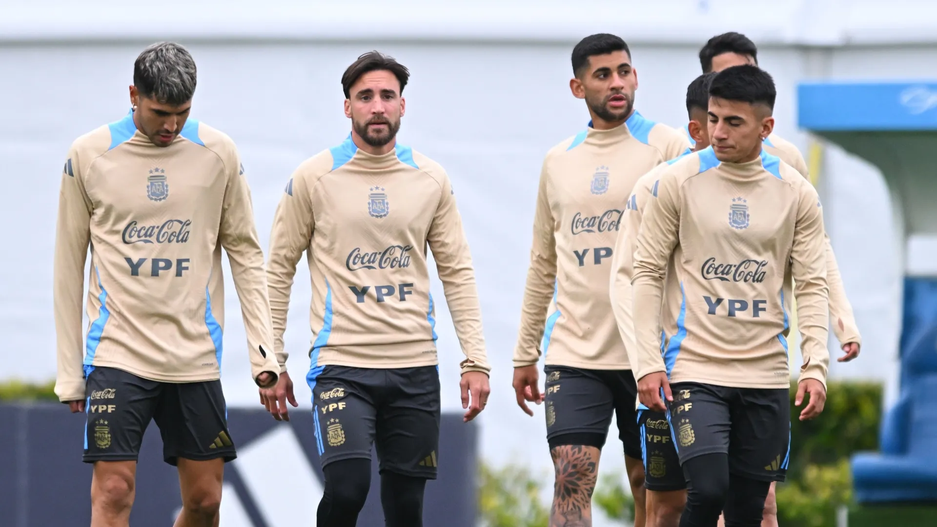 (L-R) Exequiel Palacios, Nicolas Tagliafico, Cristian Romero and Thiago Almada of Argentina walk during a training session.