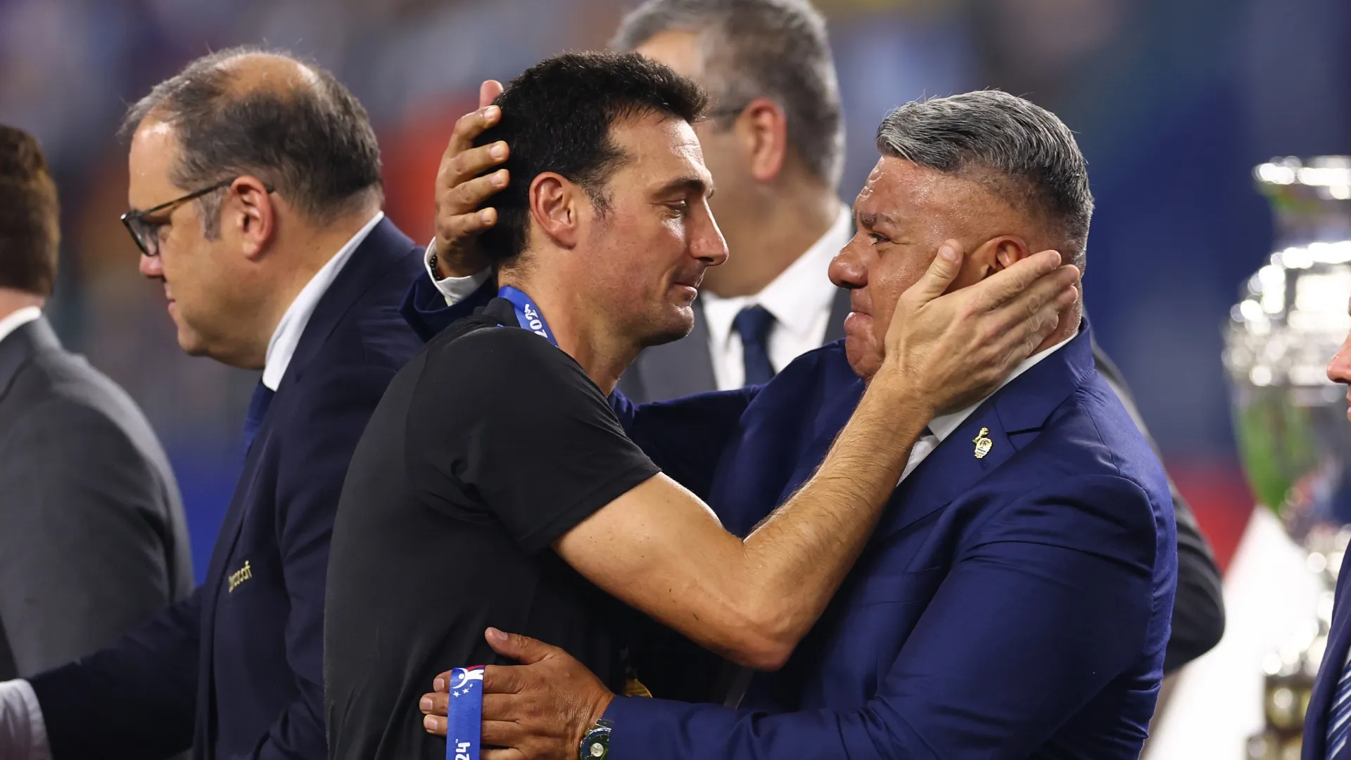 Lionel Scaloni, Head coach of Argentina hugs AFA president Claudio Tapia after winning the 2024 Copa America.