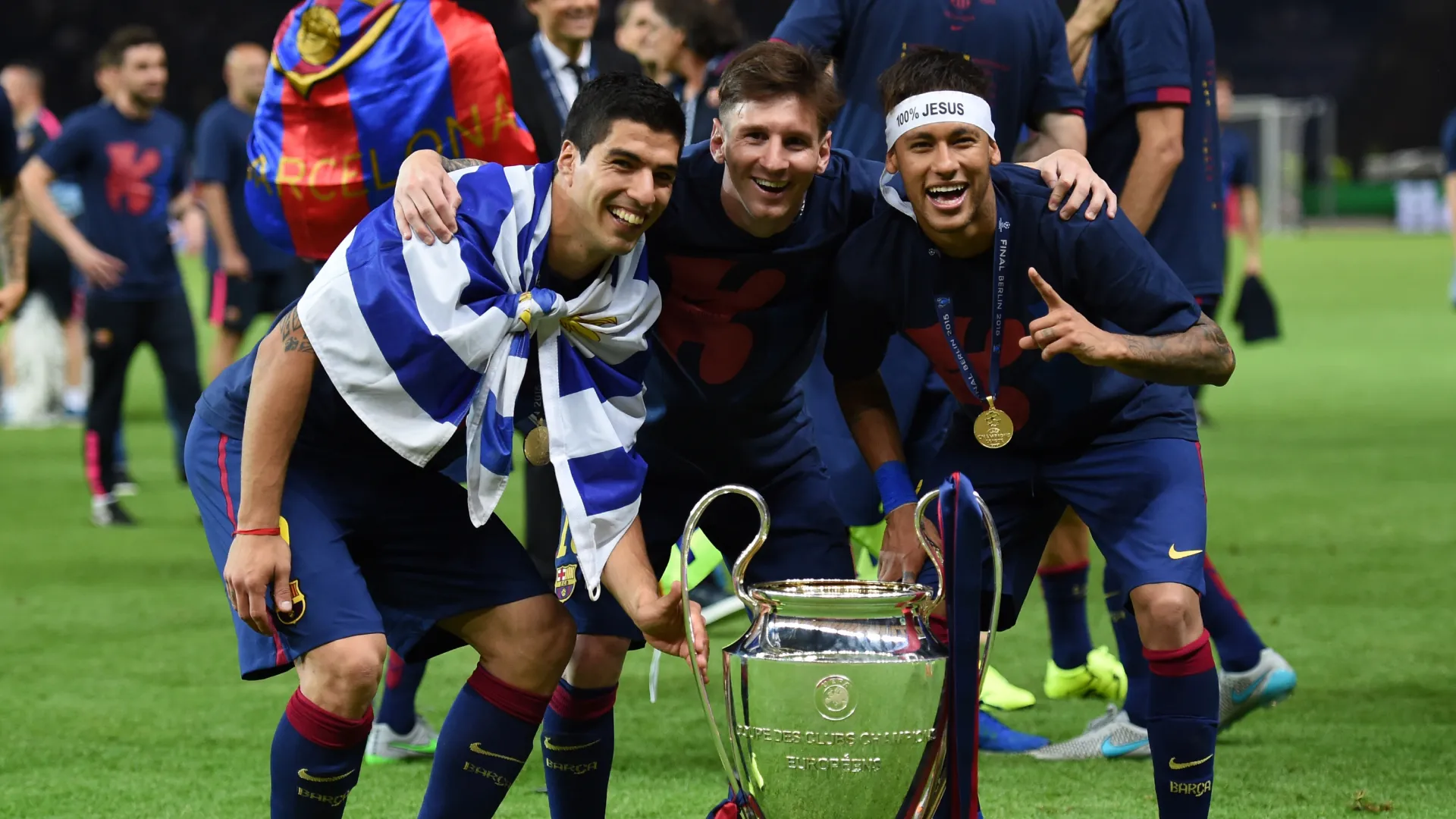 Luis Suarez, Lionel Messi and Neymar celebrate with the UEFA Champions League trophy. (Getty Images)