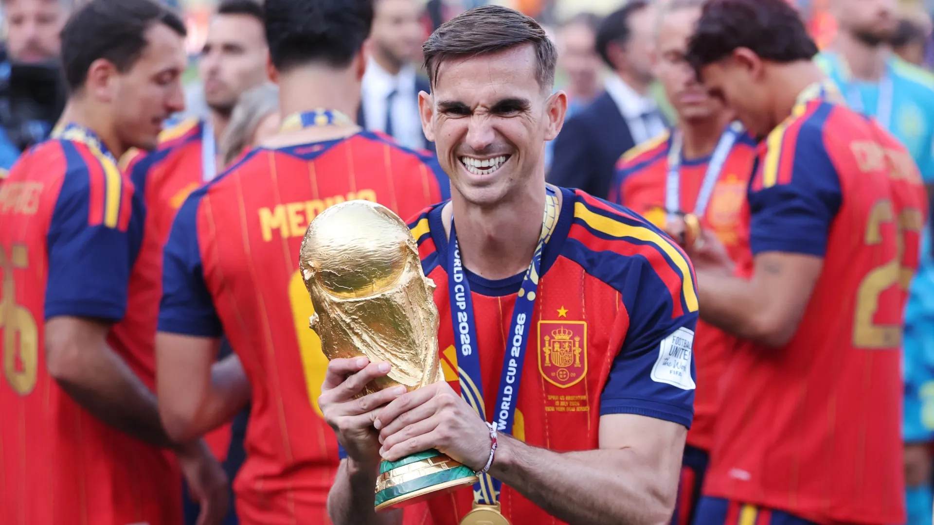 Fabian Ruiz #8 of Spain celebrates with the FIFA World Cup.