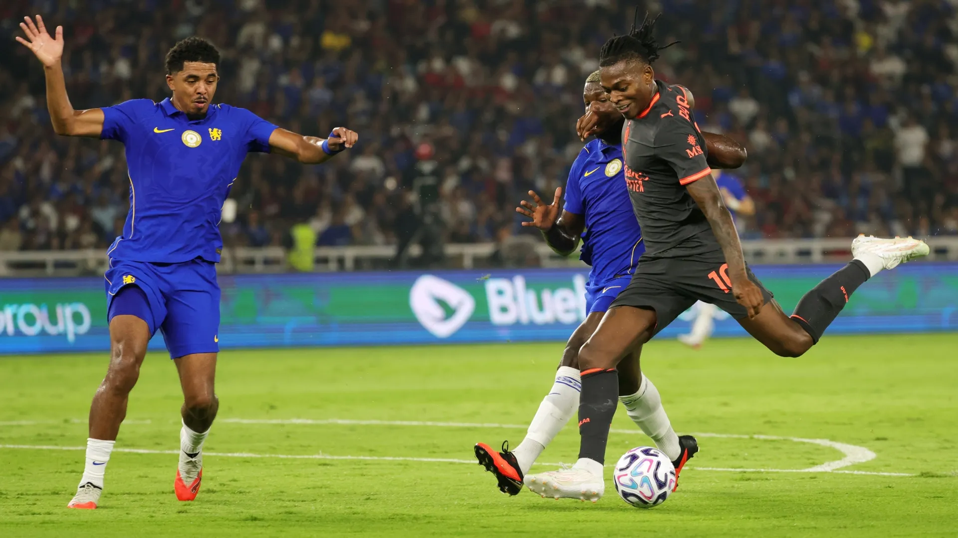 Rafael Leao of AC Milan shoots against Wesley Fofana of Chelsea.