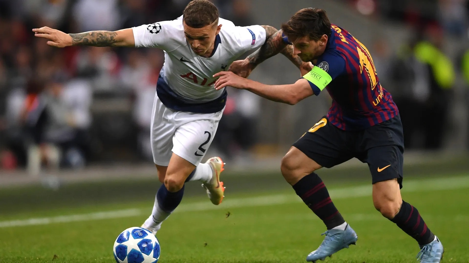 Kieran Trippier of Tottenham Hotspur battles for possession with Lionel Messi of Barcelona. (Getty Images)