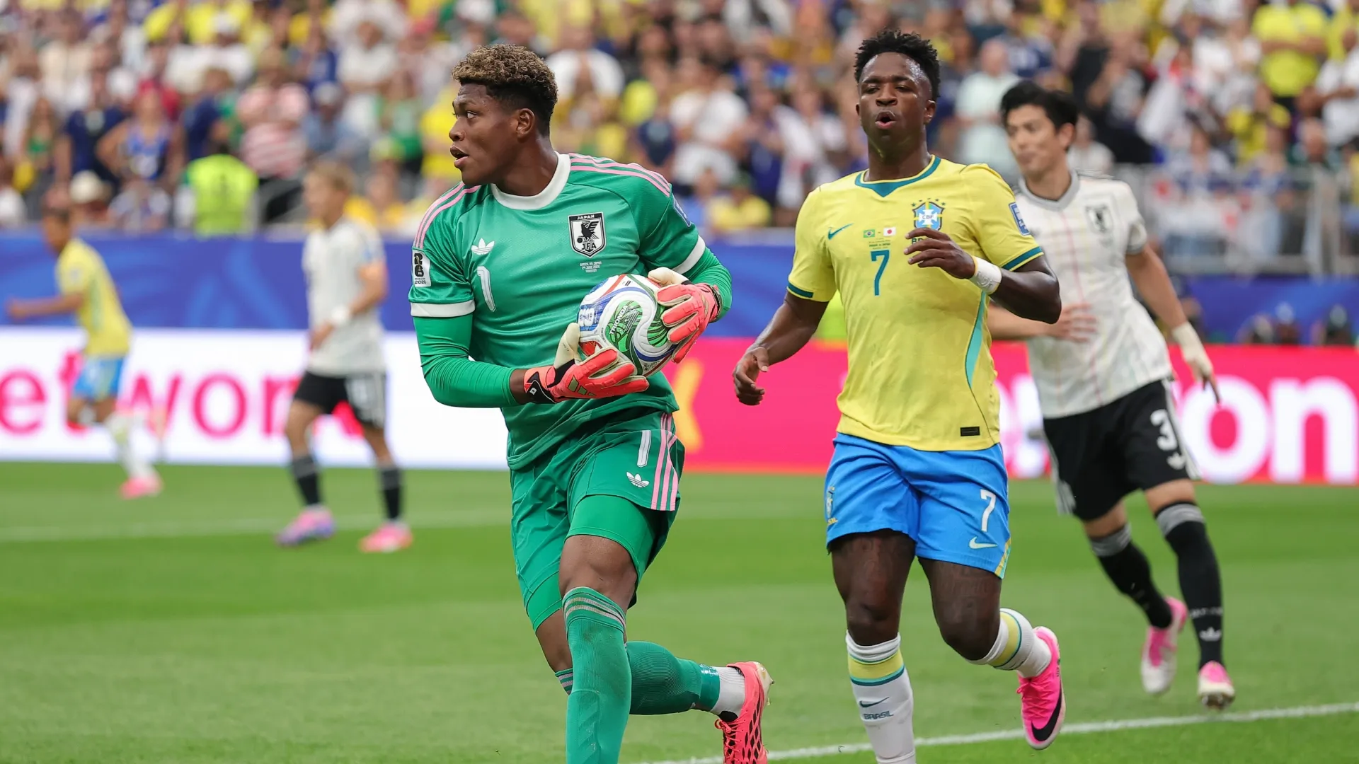 Zion Suzuki of Japan makes a save during the 2026 World Cup clash against Brazil.